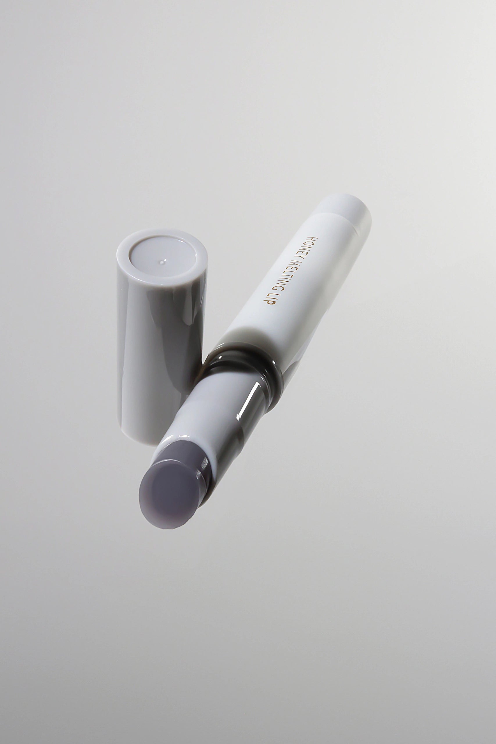 Honey Melting Lip 12 Mood Plumping - Lip gloss with volume effect